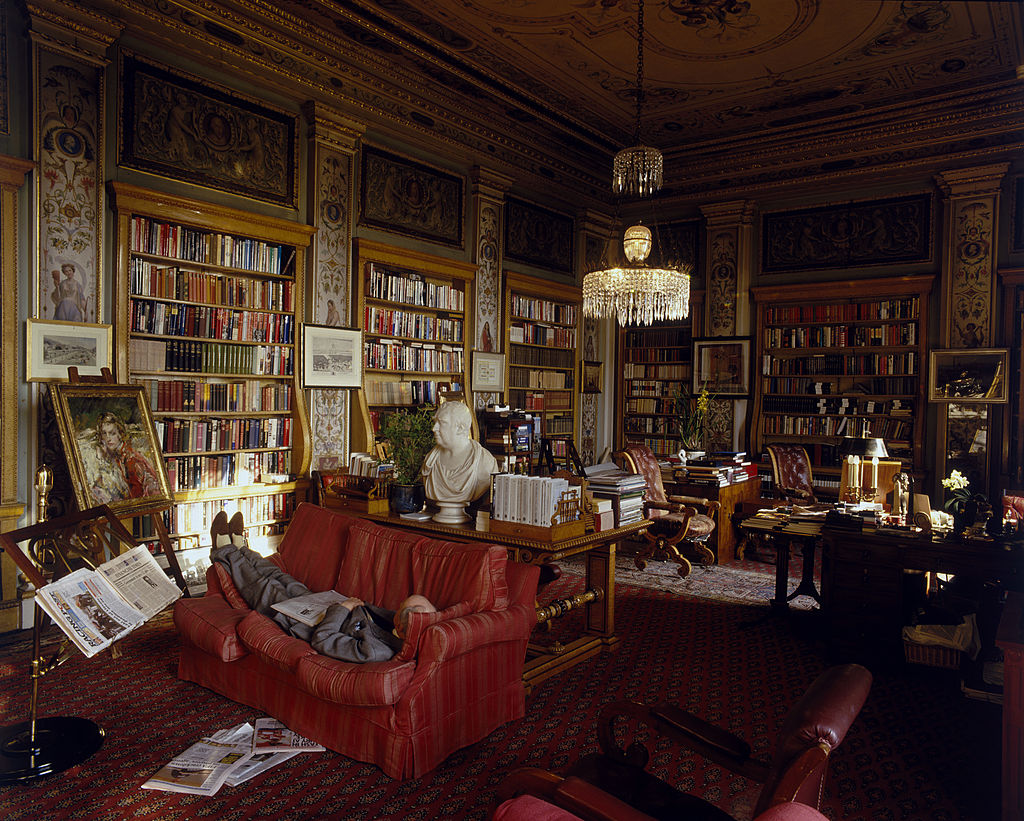 Chatsworth Library by Hulton Archive/Getty Images, 1955. The 11th Duke of Devonshire takes a nap in the Lower Library of Chatsworth House, Derbyshire, circa. Open Edition C-Type Photographic Print. Landscape orientation. Available at Electric Gallery, London, UK.