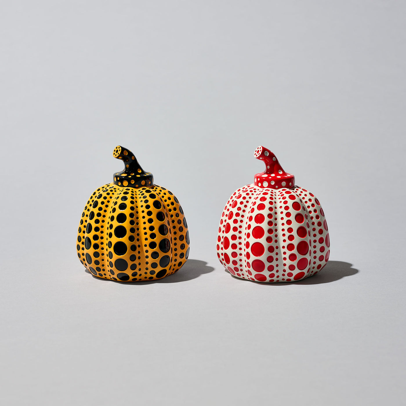 Pumpkin Object Pair (Yellow/Black) & (White/Red) by Yayoi Kusama