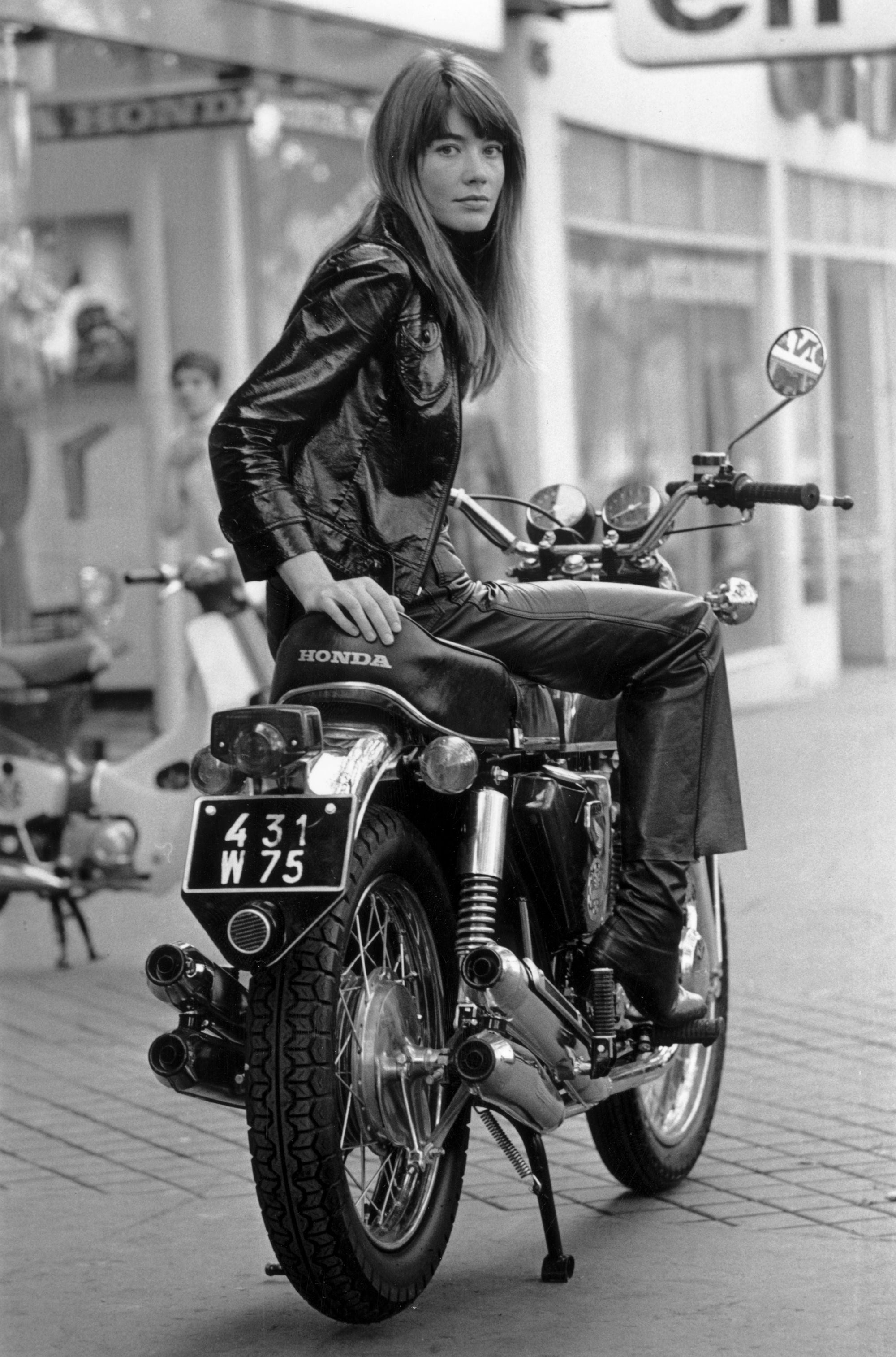 Francoise Hardy by Reg Lancaster/Getty Images, 1969. French singer, Francoise Hardy sitting on a motorbike.. Open Edition Resin Photographic Print. Portrait orientation. Available at Electric Gallery, London, UK.
