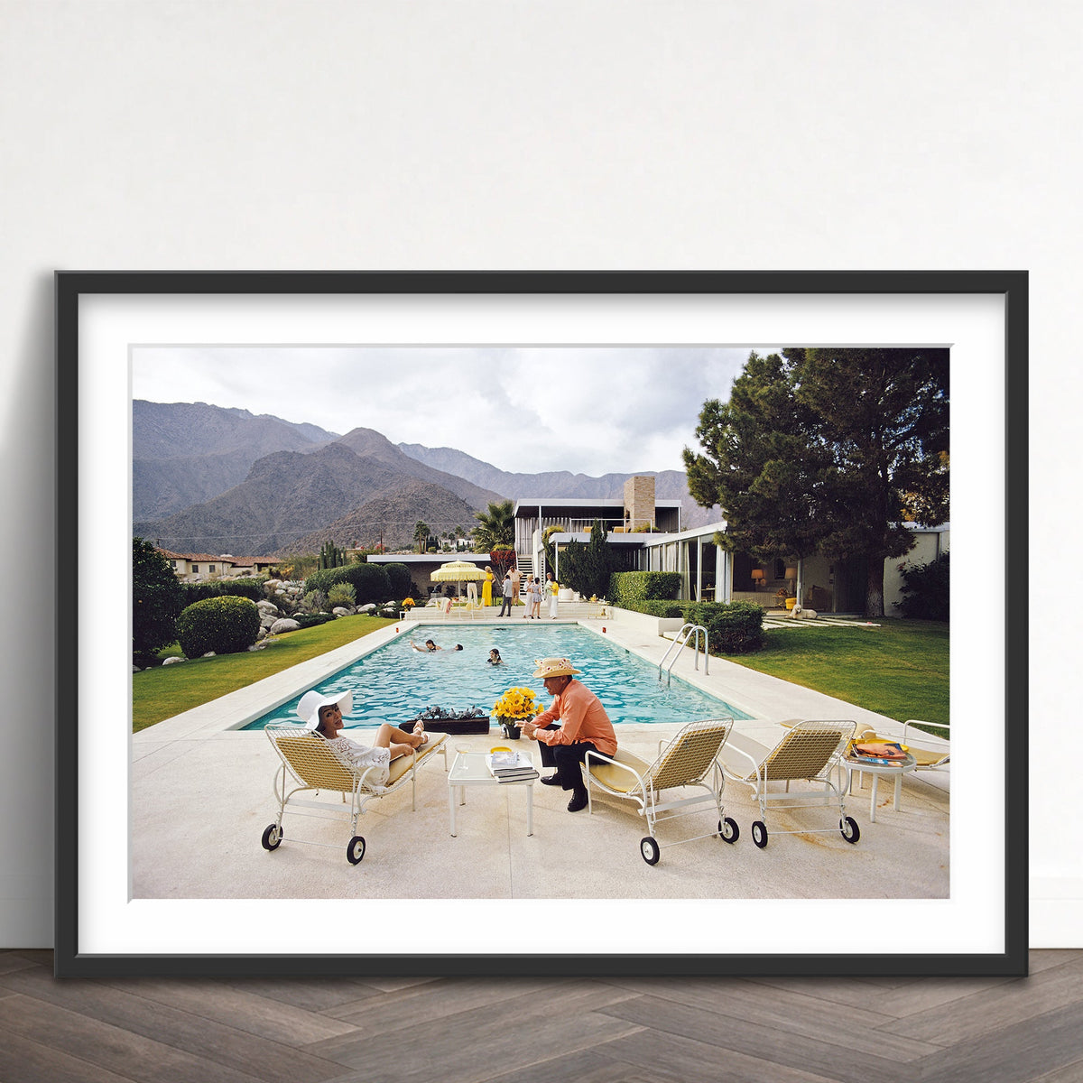 Slim Aarons - poolside interruption - Photography - Getty Images