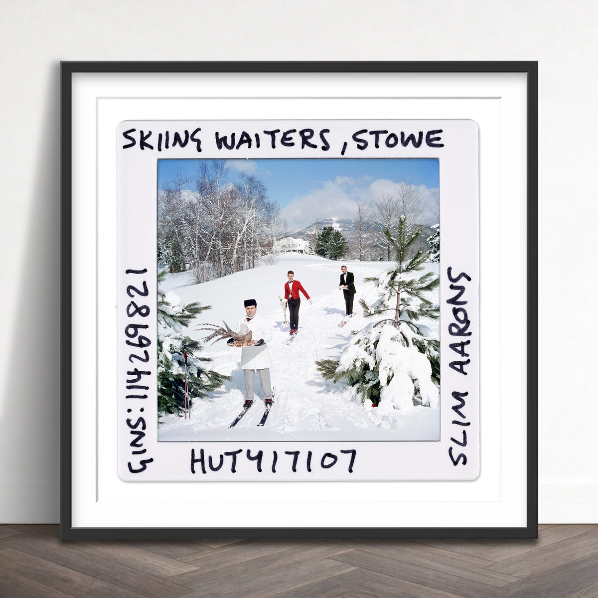 Slim Aarons - skiing waiters slide - Photography - Getty Images