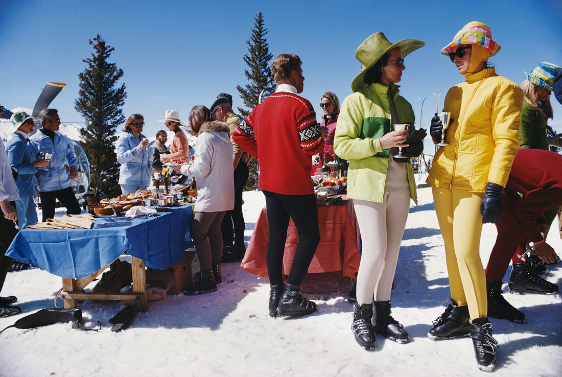 Snowmass Gathering by Slim Aarons/Getty Images, 1972. Open Edition C-Type Photographic Print. Landscape orientation. Available at Electric Gallery, London, UK.