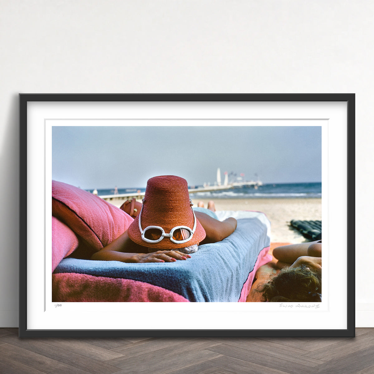 Slim Aarons Limited Edition Estate Stamped sunbathing in venice limited edition 1496422871 Framed