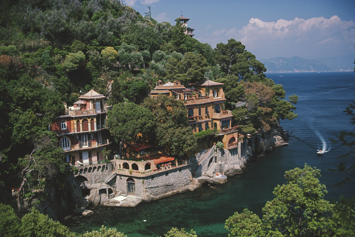 1985, The most exclusive fishing village in Italy, Portofino, on Italy's Ligurian coast. Slim Aarons photograph.
