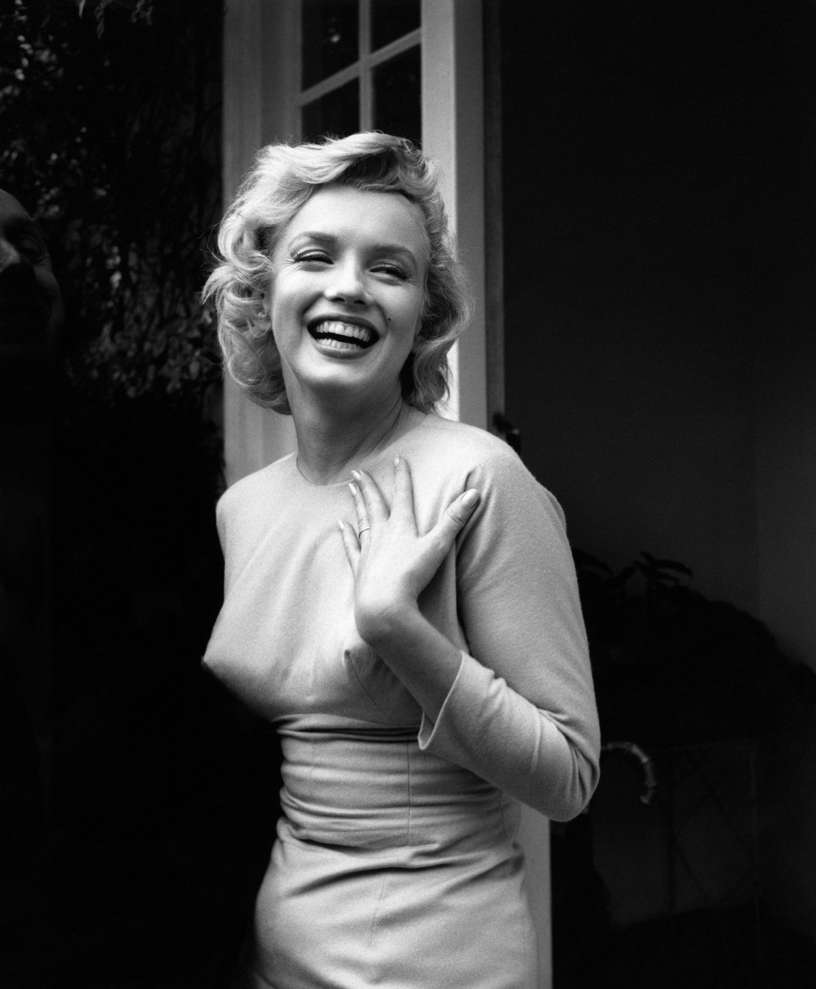 Happy Marilyn by Evening Standard/Getty Images. American film star Marilyn Monroe outside her home at Englefield Green.. Open Edition Resin Photographic Print. Portrait orientation. Available at Electric Gallery, London, UK.