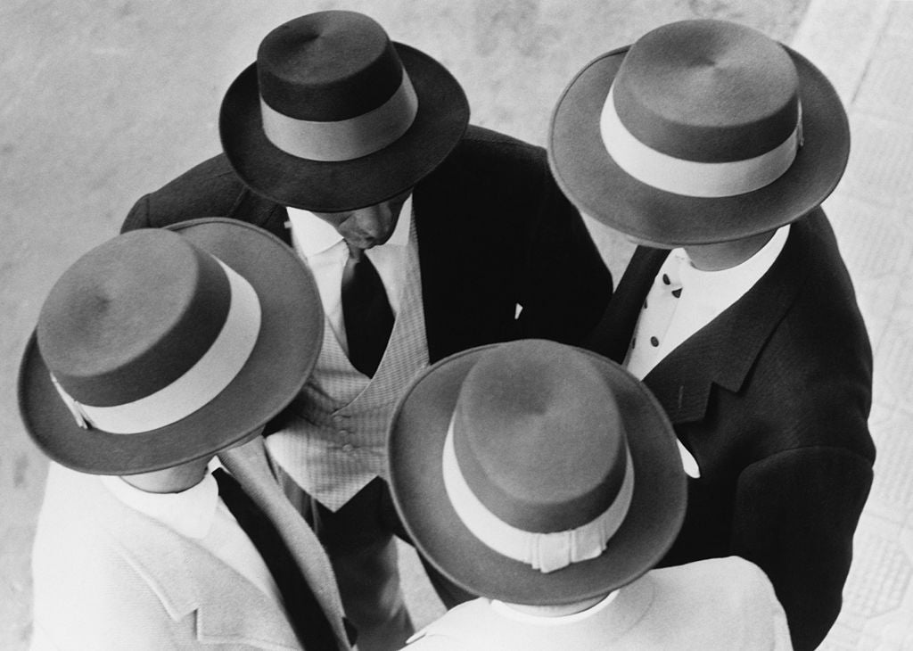 Italian Hats by Hulton Archive/Getty Images, 1957. Models wearing a collection of Italian designed hats for winter. Open Edition Resin Photographic Print. Landscape orientation. Available at Electric Gallery, London, UK.