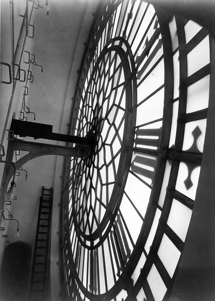 Inside St Stephen's by Hulton Archive/Getty Images, 1925. Inside St Stephen's Tower, Westminster Palace, showing the 23 ft diameter clock-face of Big Ben, named after the bell weighing 13.. Open Edition Resin Photographic Print. Portrait orientation. Available at Electric Gallery, London, UK.