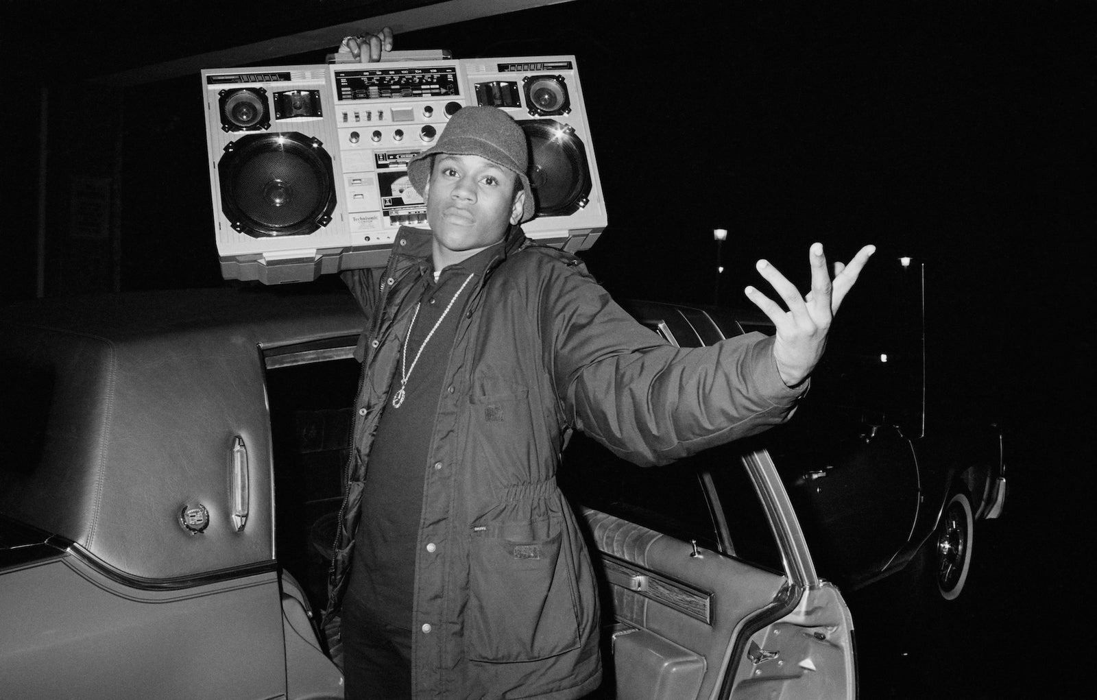 LL Cool J by Michael Ochs/Getty Images, 1986. Rapper LL Cool J holds a boombox outside a concert, circa. Open Edition Resin Photographic Print. Landscape orientation. Available at Electric Gallery, London, UK.