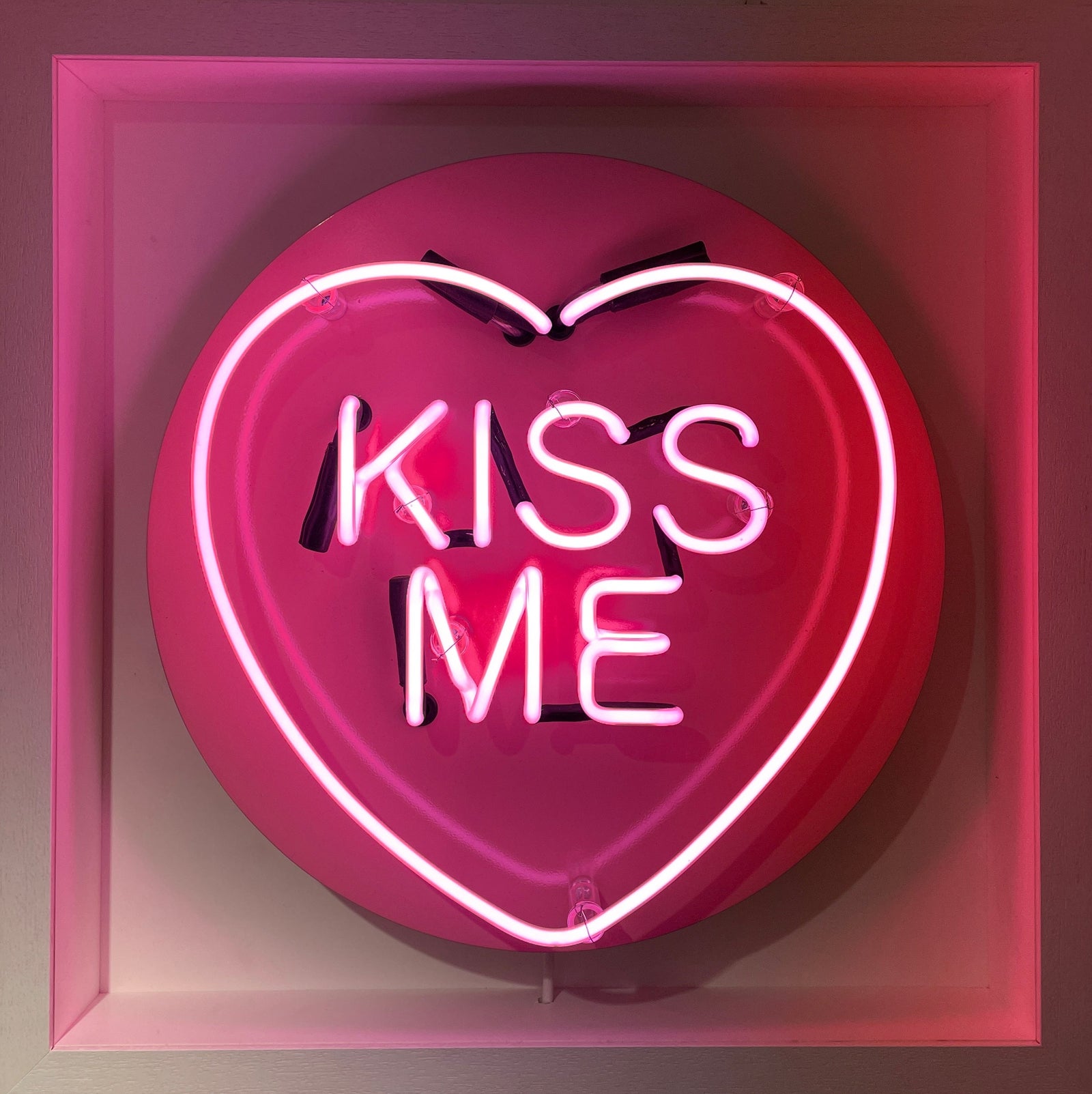 Kiss Me by Andy Cook, a original bright pink neon set on powder coated aluminium from 2021